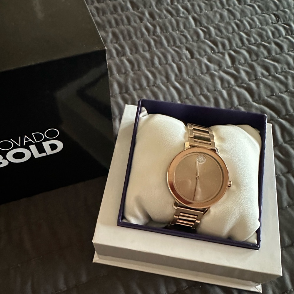 Movado Bold rose gold women’s bracelet watch.  In great working condition.